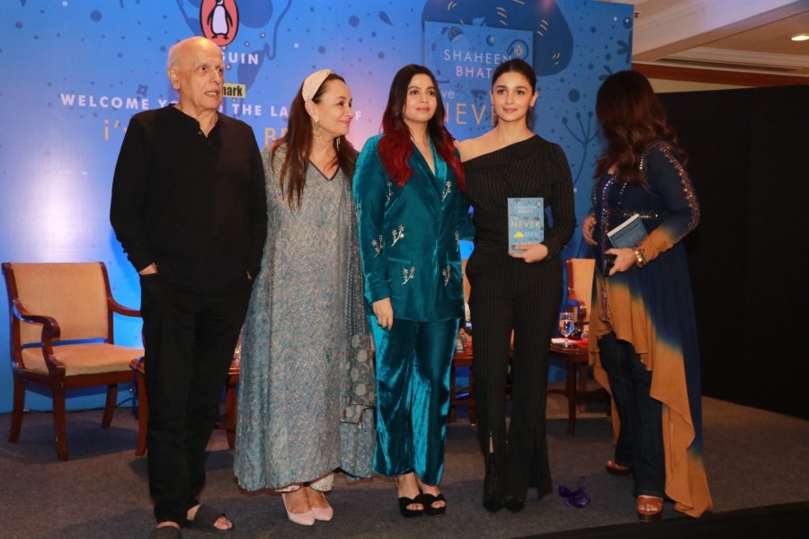 Mumbai: Author Shaheen Bhatt with his parents Mahesh Bhatt, Soni Razdan and sisters Alia Bhatt and Pooja Bhatt at the launch of her book "I've Never Been (un)Happier" in Mumbai on Dec 4, 2019. (Photo: IANS) by .