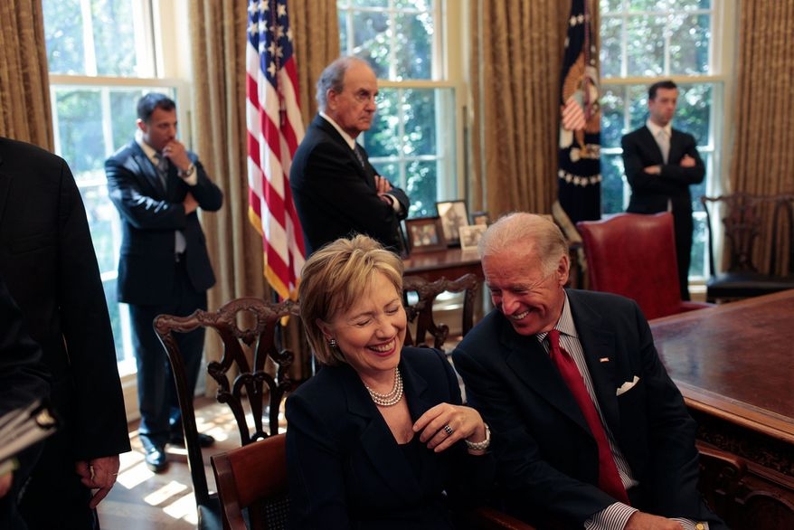 Hillary Clinton and former Vice President Joe Biden in the foreground in a photograph posted on Biden's Twitter account after Clinton endorsed him. by .