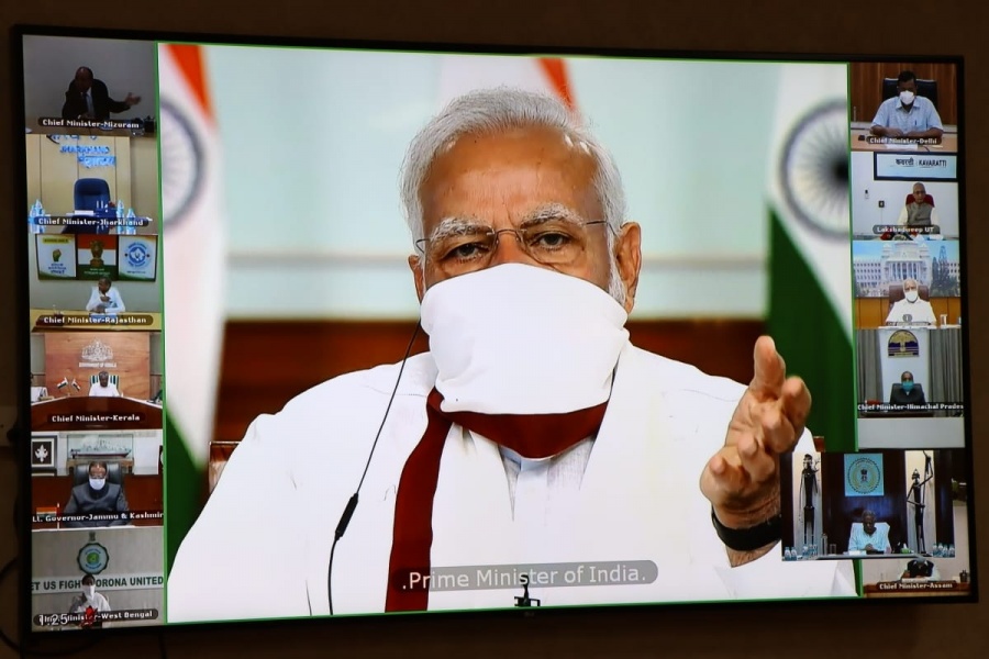 Prime Minister Narendra Modi during the video conferencing of Chief Ministers. by .