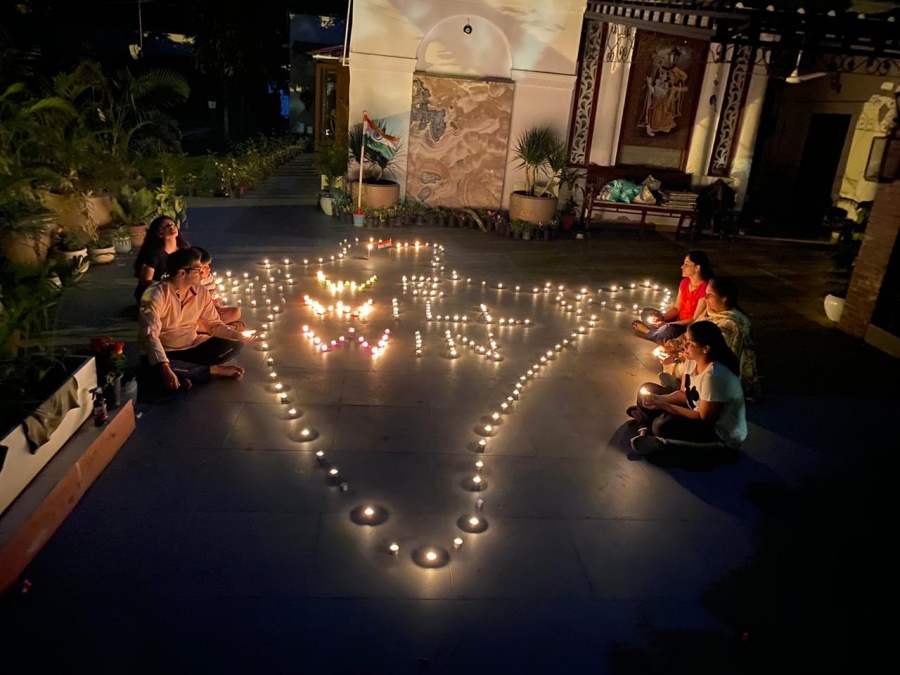 New Delhi: People light 'diyas' and candles in their balconies after Prime Minister Narendra Modi urged people in a video message to the nation to turn off their lights for nine minutes at 09:00 pm on April 5 and light a candle or a 'diya' or even use the flashlight to mark the country' fight against COVID-19 pandemic in New Delhi on April 5, 2020. (Photo: IANS) by .