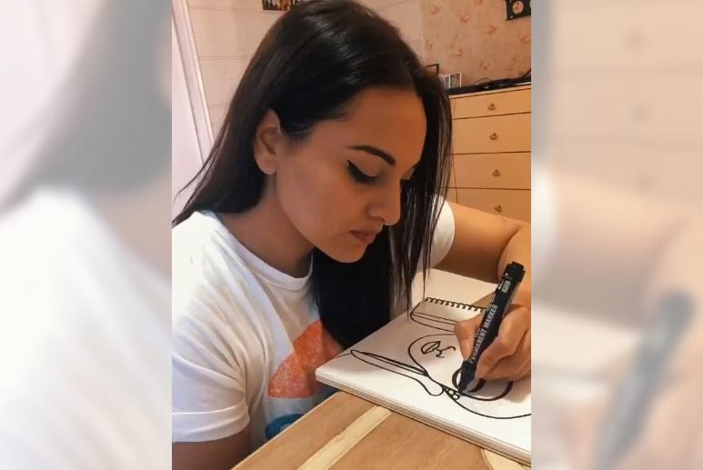 Sonakshi explores her love for drawing faces, as she auctions paintings. by .