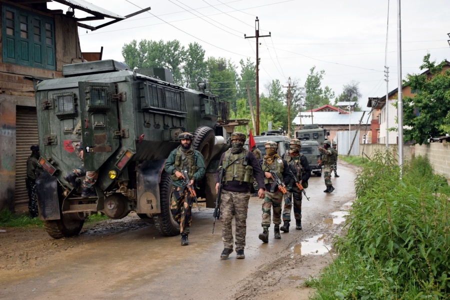 Pulwama: Security forces conduct cordon and search operations after two militants were killed in a gunfight with the security forces in Jammu and Kashmir's Pulwama district, on May 18, 2019. One of the slain militants has been identified as Showkat Ahmad Dar, a resident of Panzgam village. He belonged to the Hizbul Mujahideen (HM) outfit. (Photo: IANS) by .