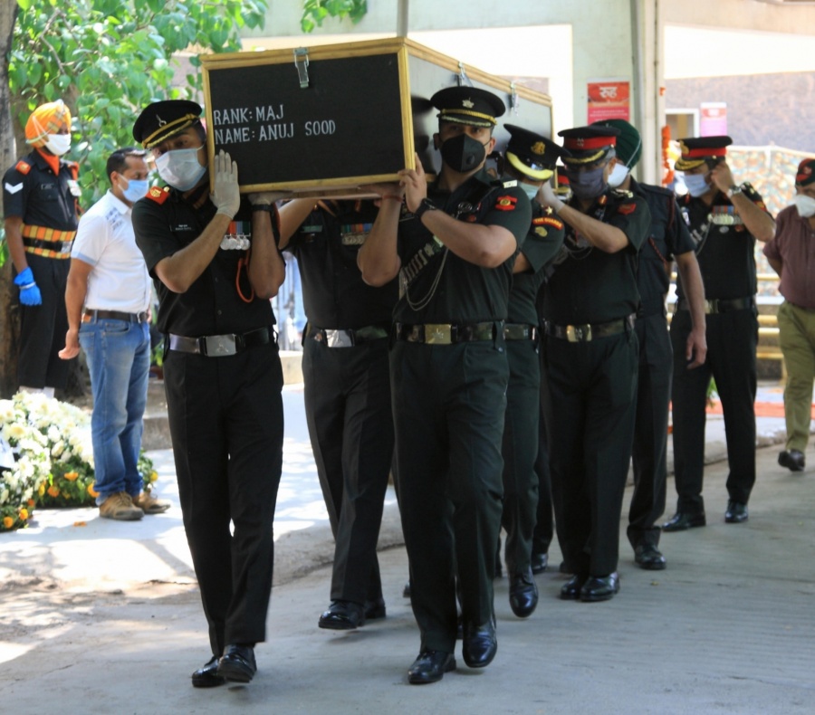 Mortal remains of martyr Maj Anuj Sood were consigned to flames today at Mani Majra cremation ground with full military honours in Chandigarh on May 5, 2020. He had laid down his life fighting the militants in Handwara (Kupwara) in Kashmir. by .