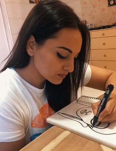 Sonakshi explores her love for drawing faces, as she auctions paintings. by . 