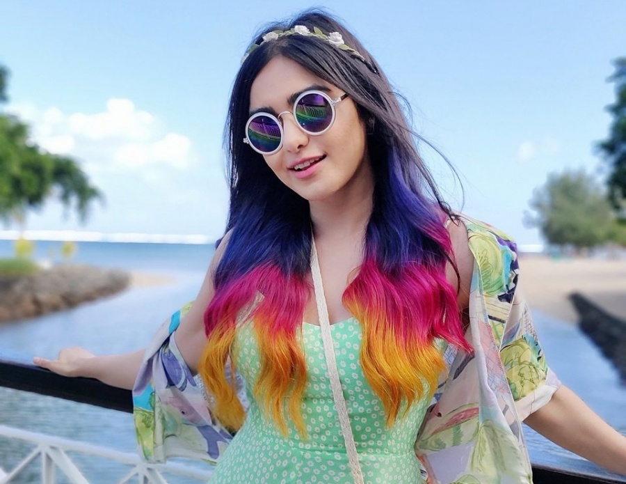 Actress Adah Sharma, who is set to make her debut in the web space with a series titled "The Holiday", has got her hair coloured in three layers -- purple, pink and orange. by .