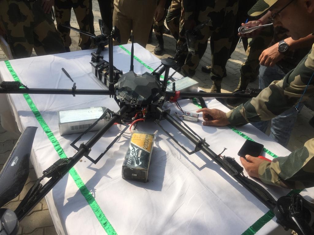BSF shoots down Pak drone carrying weapons in J&K's Kathua. by .