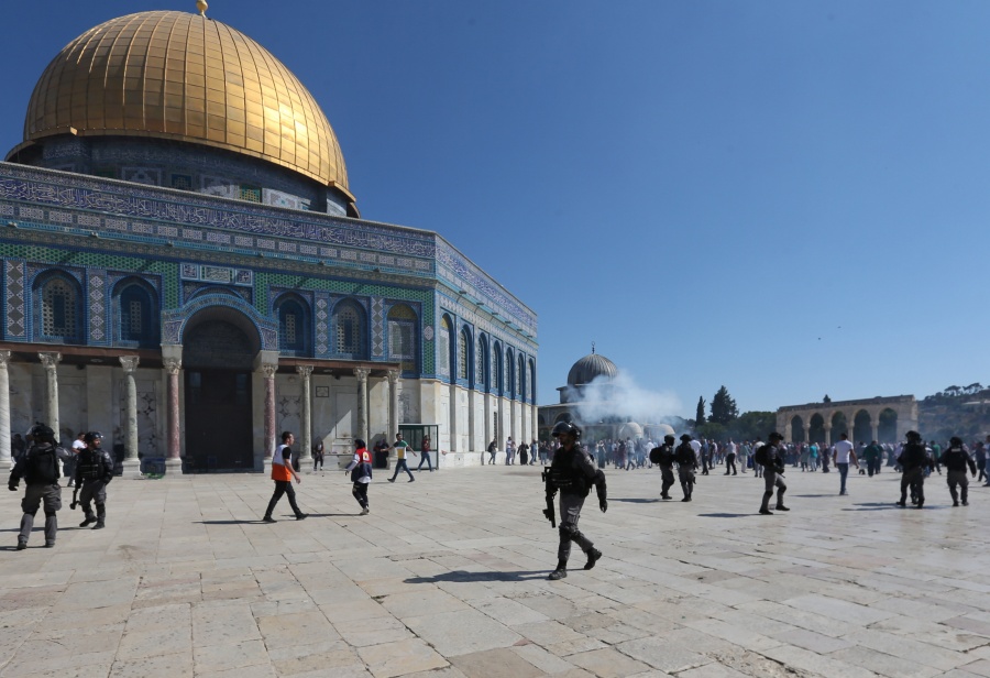 JERUSALEM, Aug. 11, 2019 (Xinhua) -- Palestinians clash with Israeli police at the Al-Aqsa Mosque compound in East Jerusalem, Aug. 11, 2019. Clashes erupted on Sunday in East Jerusalem's holy site between Muslim worshippers and Israeli police, sparking fresh tensions, Israeli and Palestinian officials said. The Palestinian Red Crescent said at least 14 Palestinians were injured as the Israeli police stormed the Al-Aqsa Mosque compound. The Al-Aqsa Mosque compound, known to the Jewish people as the Temple Mount, is sacred to both Muslims and Jews. (Photo by Muammar Awad/Xinhua/IANS) by .
