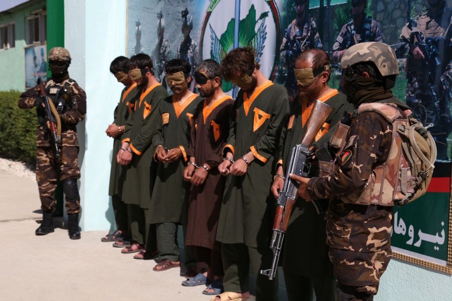 GHAZNI, June 28, 2020 (Xinhua) -- Militants stand handcuffed after being arrested in Ghazni province, eastern Afghanistan, June 28, 2020. Ten militants have been killed as warplanes struck a Taliban gathering in Afghanistan's eastern Ghazni province on Sunday, provincial government spokesman Wahidullah Jumazada said. The security forces also captured six more militants from Ghazni city, the provincial capital, and its surrounding areas over the past couple of days. (Photo by Sayed Mominzadah/Xinhua/IANS) by .