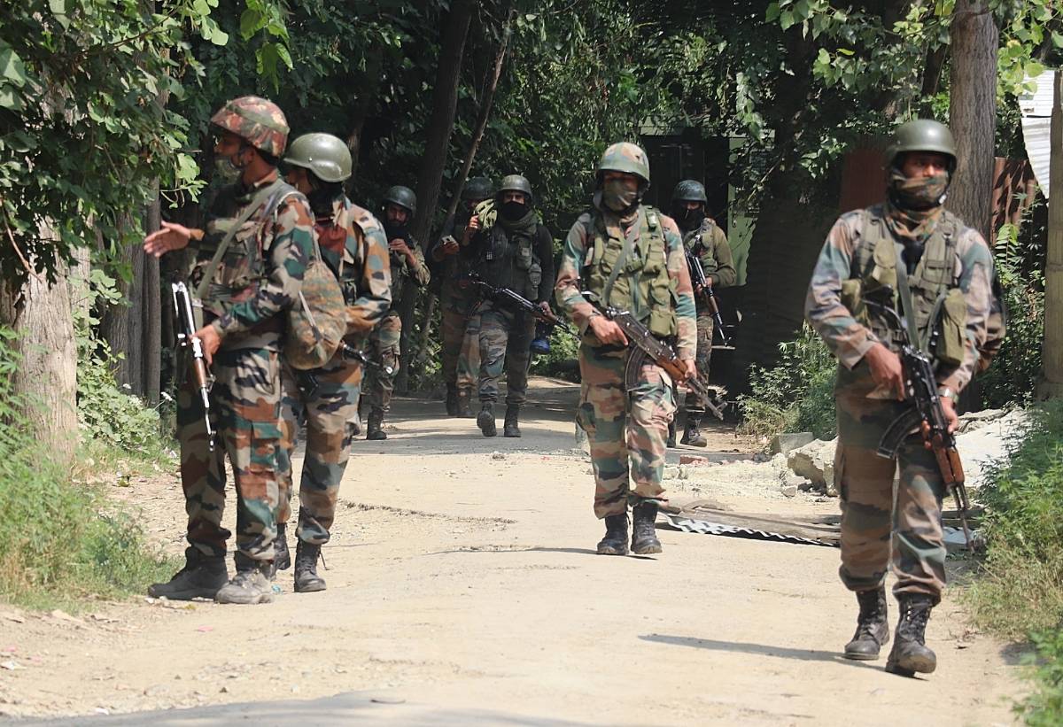 Srinagar: Army personnel conduct a cordon and search operation after two terrorists were killed in an encounter with the security forces at Ranbirgarh Panzinara on the outskirts of Srinagar on July 25, 2020. (Photo: IANS) by .