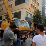 Beirut, Aug. 8, 2020 (Xinhua) -- Protesters destory a crane truck in downtown Beirut, Lebanon, on Aug. 8, 2020. A Lebanese police officer was killed and 142 people were injured on Saturday in clashes during protests against the ruling class in downtown Beirut, days after massive explosions rocked the Lebanese capital that killed at least 158 and injured 6,000 others, LBCI TV channel reported. (Photo by Bilal Jawich/Xinhua/IANS) by .
