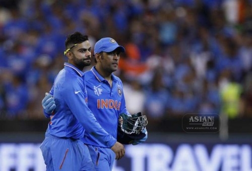 Indian cricketers Virat Kohli and M S Dhoni during an ICC World Cup 2015 match 